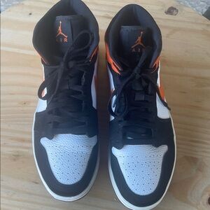 Nike air Jordan 1 Mids  Men's Black, White, and Orange Sneakers
